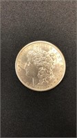 1900 Morgan Silver Dollar Almost Uncirculated