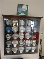 25 piece vintage tea cup collection in display