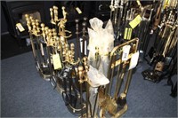 Sets of brass fireplace accessories