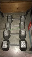 Pair of 30 pound and 25 pound dumbbells, solid