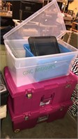 Two pink heavy duty storage containers and two