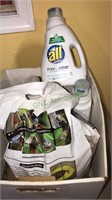Four bottles of all laundry detergent, bag of