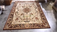 Room rug with a floral red and beige pattern,  93