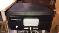 Sentry fire safe with the key, eight x 15 x 15,