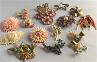 Brooches (15), plastic and metal