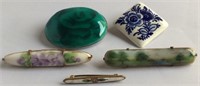 Painted porcelain or enamal brooches(5)