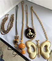 5 necklaces - 1 is Kenneth Lane, 4 large pendants