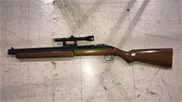 Pellet rifle with a scope, (950)