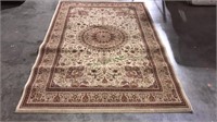 Oriental style rug with ivory and red colors, 90