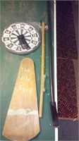 dartboard, darts, vintage ice fishing pole, ice