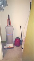 contents of bedroom closet including vacuum,
