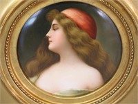 ROUND KPM PORCELAIN PLAQUE OF A WOMAN WITH RED CAP