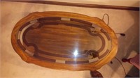 glass top oval coffee table, 45" long, 25" deep, 1