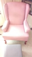 pink high back chair and gray ottoman