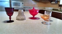 Candy dish, glasses, and red goblet