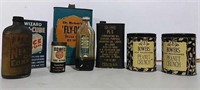 Assorted oil and advertising cans