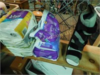 paper towels, Poise pads, air cast walking boot