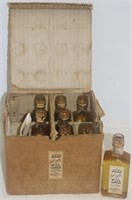 8 NYE WHALE OIL BOTTLES IN ORIGINAL SHIPPING BOX,