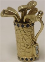 UNUSUAL 14KT. GOLD CHARM IN THE FORM OF A GOLF