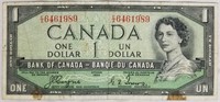 1954 CANADA DOLLAR  DEVILS FACE IN QUEENS HAIR