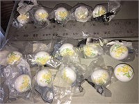 16 porcelain knobs with yellow daisies
