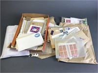 Collection of stamps and envelopes.