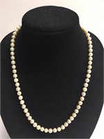 24" STRAND OF 7 - 7.5MM PEARLS W/ 14K DIAM. CLASP