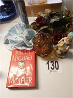 Candleholders, figurines, Judith Michael book