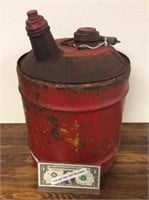 vintage red metal gas can