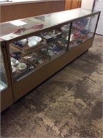Large display case contents not included