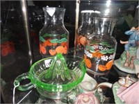 3 Orange juice carafes & Vaseline glass reamer