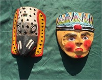 Two painted wooden masks