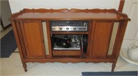 Vintage stereo cabinet with sliding front doors