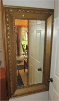 Large mirror in frame. Measures 51" tall x 29"
