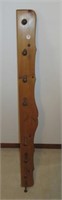 Pine wall coat rack with eight hooks. Measures