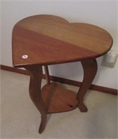 Heart shaped side table. Measures 24.5" h x 18.5"