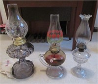 (3) Vintage oil lamps of various designs. Tallest