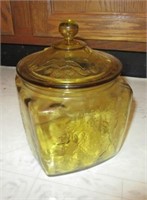 Amber glass biscuit jar. Measures 7.5" tall.