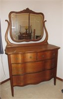 Antique oak curved front four drawer dresser with