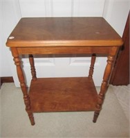Two tier bedside table. Measures 23" h x 12 " w