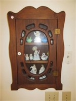 Wood wall cabinet with glass front door including