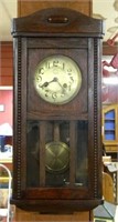 Oak Cased Wall Clock with Beaded Trim.