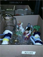 Box of figurines and mugs