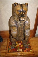 CARVED WOODEN BEAR ON STAND SIGNED NAVA 20 INCH X