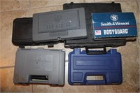 6 PISTOL HARD CASE & 1 SMITH & WESSON BOX NO GUNS