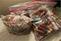 4 BAGS OF 12 GAUGE SHOTGUN SHELLS OVER 100 ROUNDS