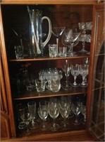 Contents of china cabinet - crystal stemware,