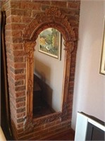 Carved frame wall mirror. 62"h x 28"w