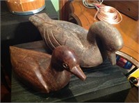 Pair of wooden ducks.