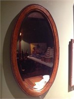 Oak framed oval mirror,  26" x 16"